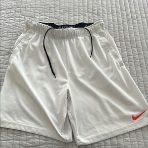Nike Men’s White and Orange shorts 9 in inseam in large
